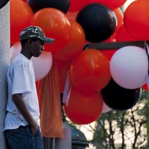 Jerry van de Beek - Boy with Balloons at the Giants Parade